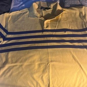 Men’s yellow vintage polo size XXL. Excellent condition. Four blue stripes.